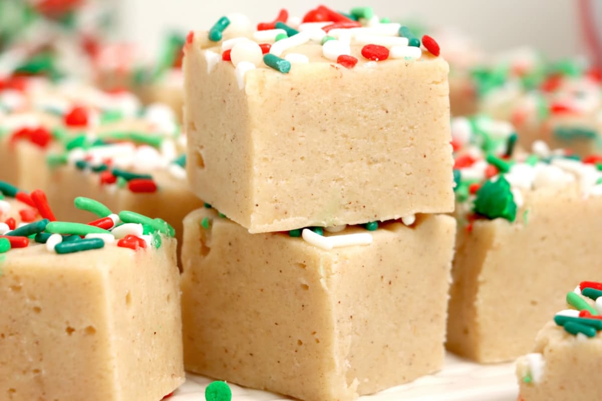 Grandma's holiday-themed peanut butter fudge squares topped with festive sprinkles.