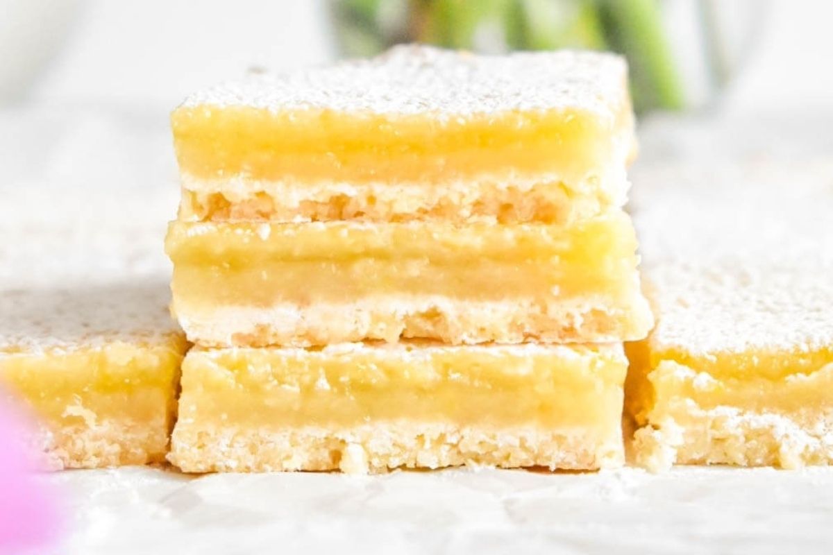 A stack of lemon bars perfect for potluck desserts.
