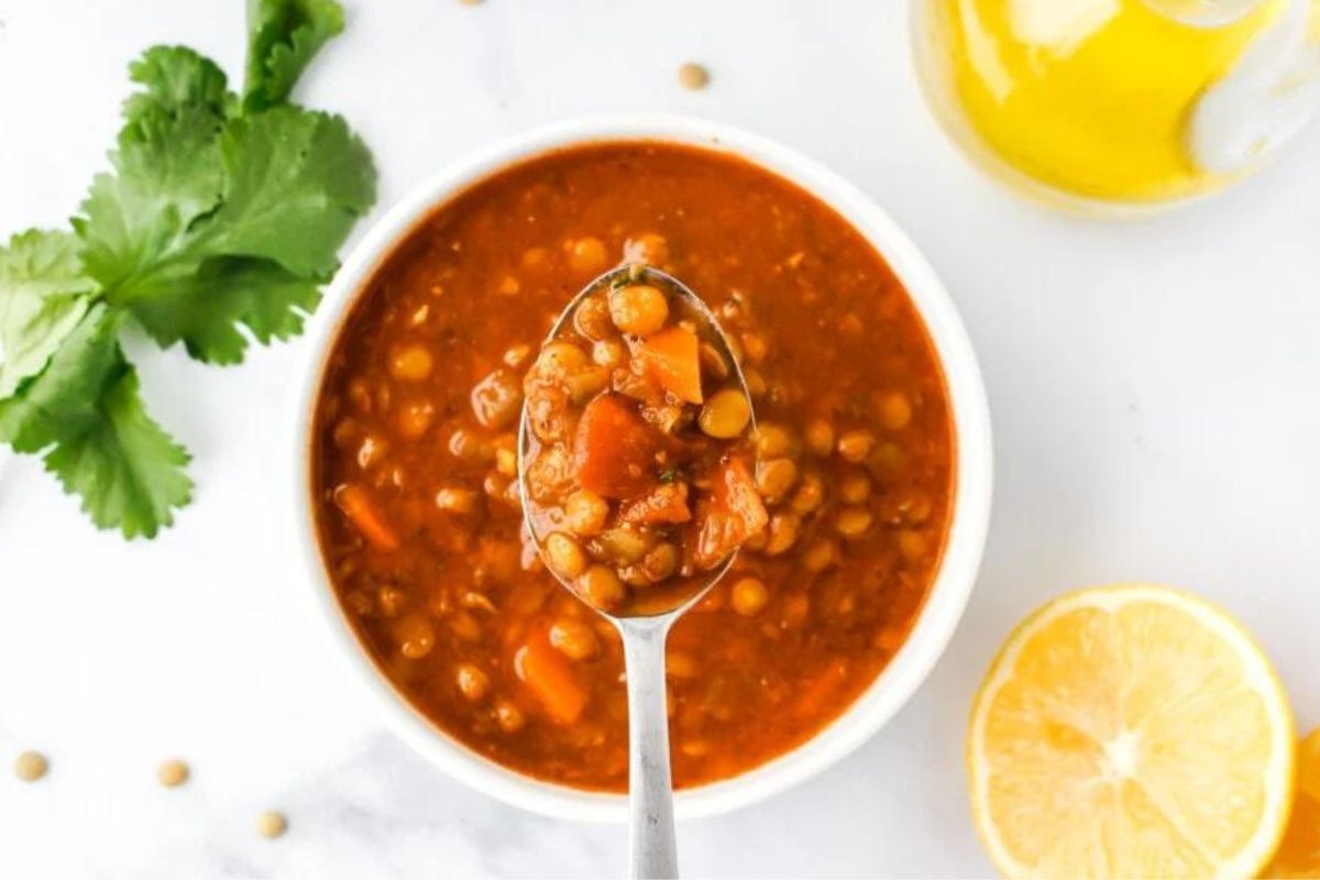 A bowl of soup with a spoon, perfect for trying new soup recipes.
