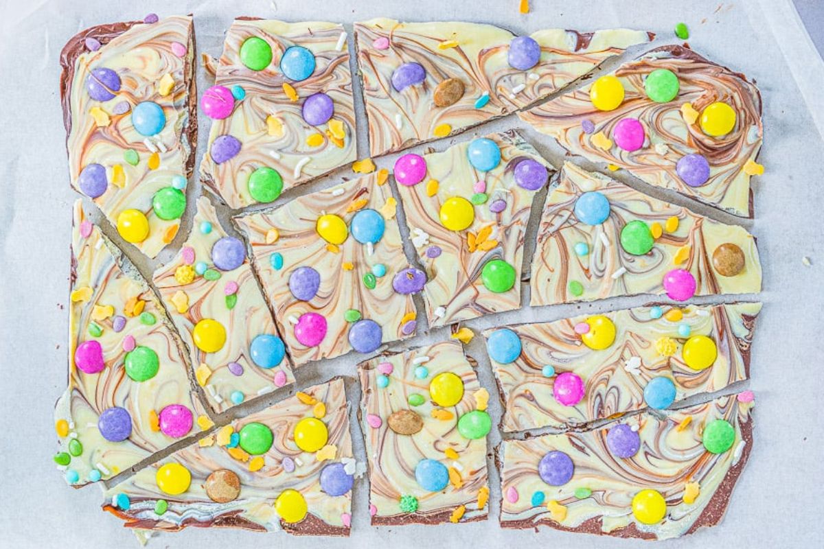 Colorful Easter desserts candy-topped chocolate bark cut into pieces.