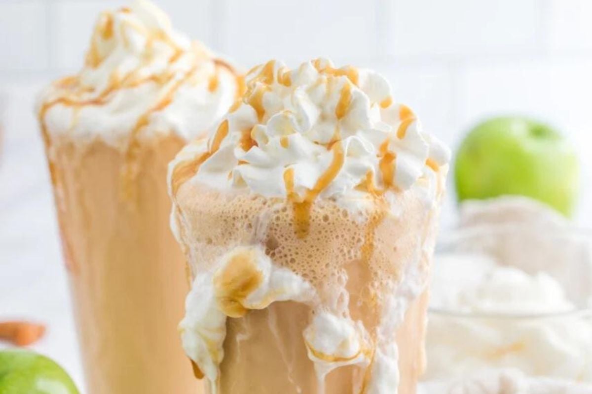 Caramel Recipes-inspired frappes topped with whipped cream.