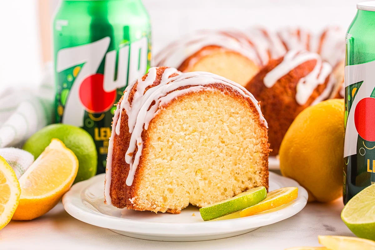 7Up poundcake with a glaze, on a serving plate.