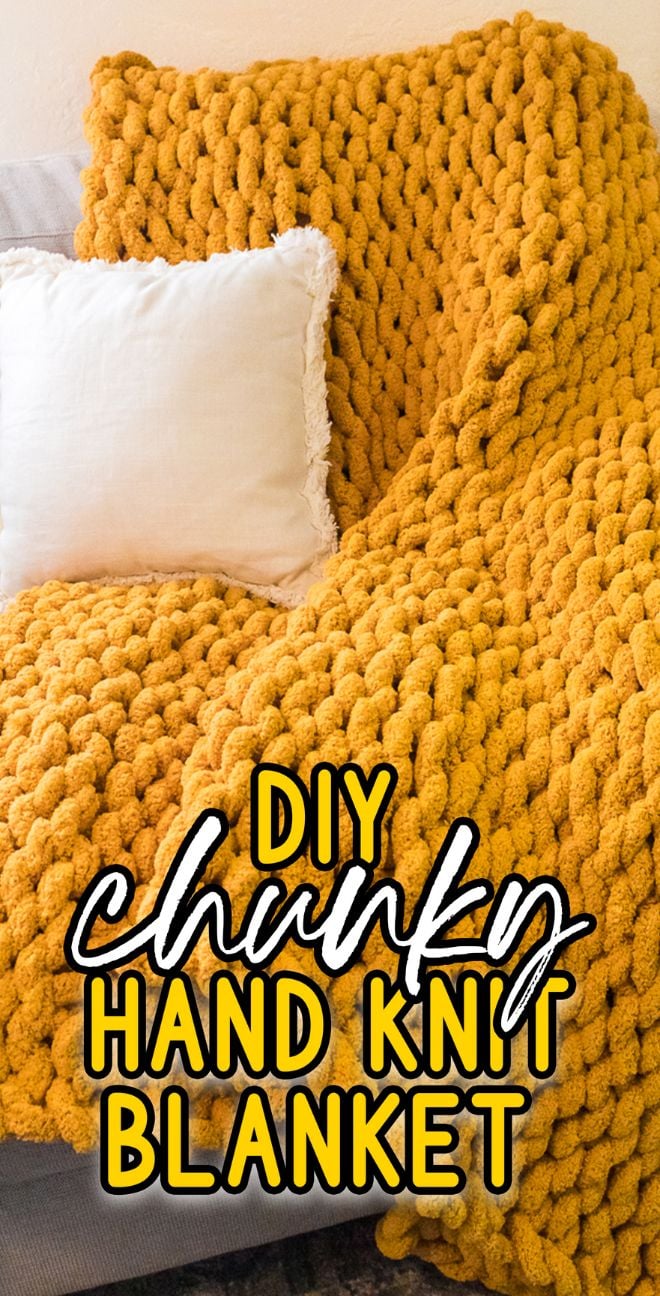 A chunky hand knit blanket in mustard yellow drapes over a couch with a white pillow; text reads "DIY Chunky Hand Knit Blanket.