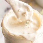 A spoonful of creamy homemade blue cheese dressing.