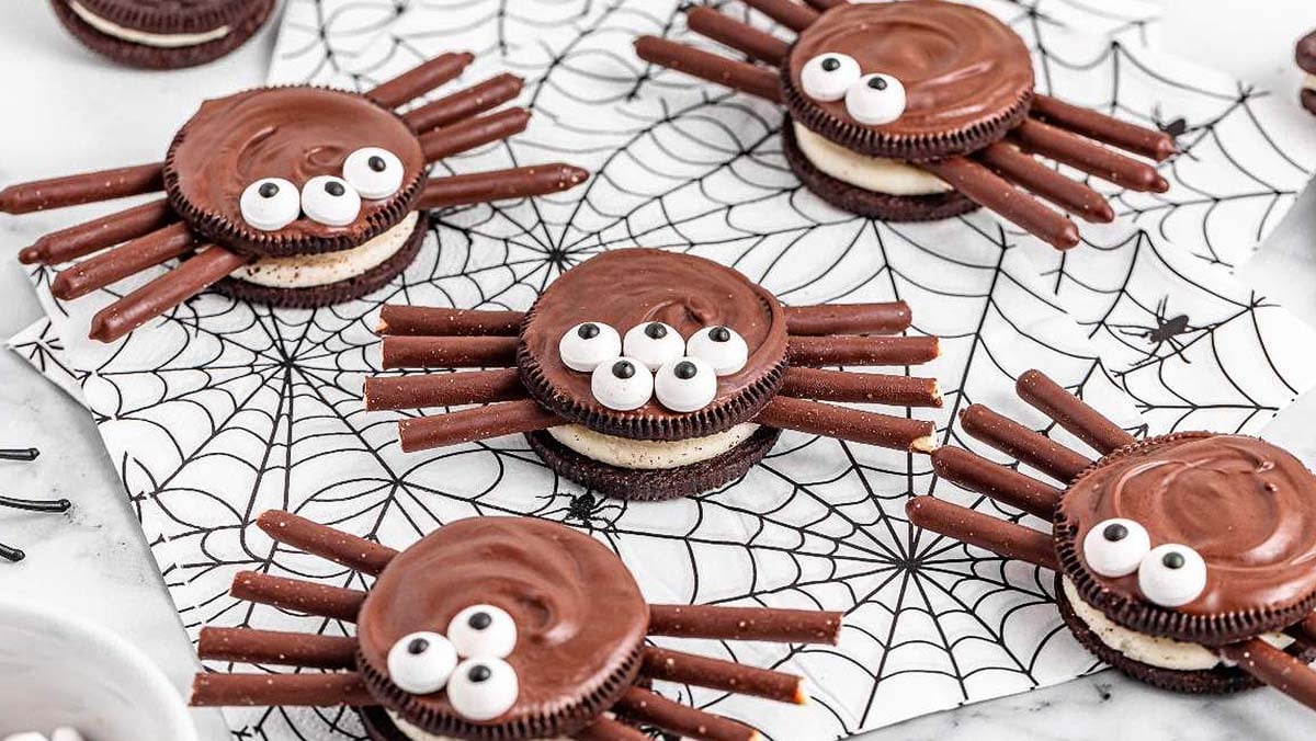 Cute and creepy Halloween treats using Oreos and pretzels to make spider legs.