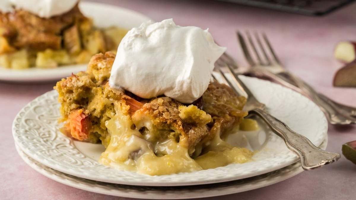 Soft cake layered with tangy rhubarb and creamy custard.