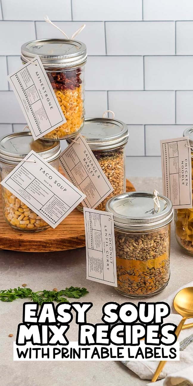 Jars of soup mix in a jar, each with attached labels, are displayed on a wooden surface. Text reads "Easy Soup Mix Recipes with Printable Labels"