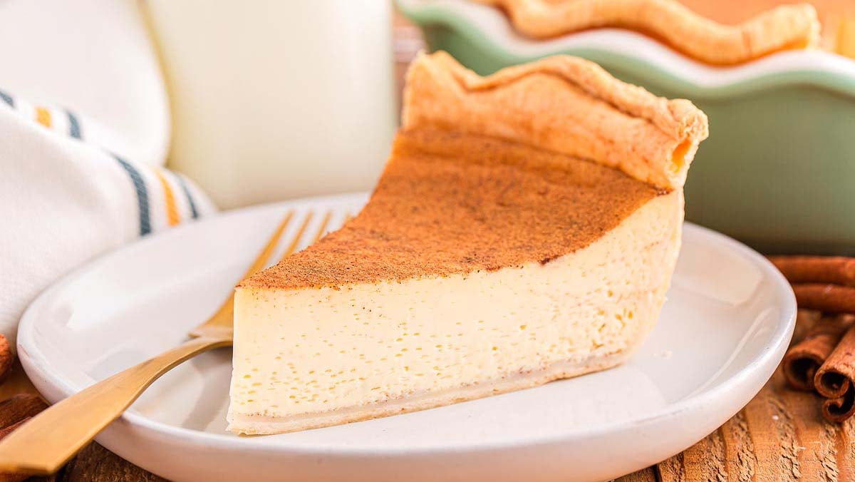 Smooth and creamy egg custard pie with a golden, flaky crust.