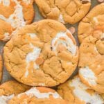 Close-up of fluffernutter cookies with a golden-brown crust and visible white marshmallow streaks.