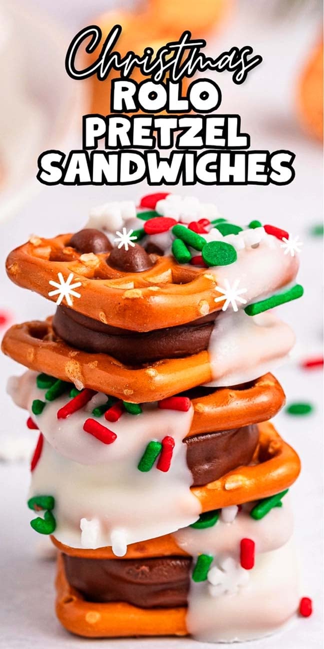 A delightful stack of Christmas Rolo pretzel sandwiches, each coated in velvety white chocolate and crowned with festive sprinkles.