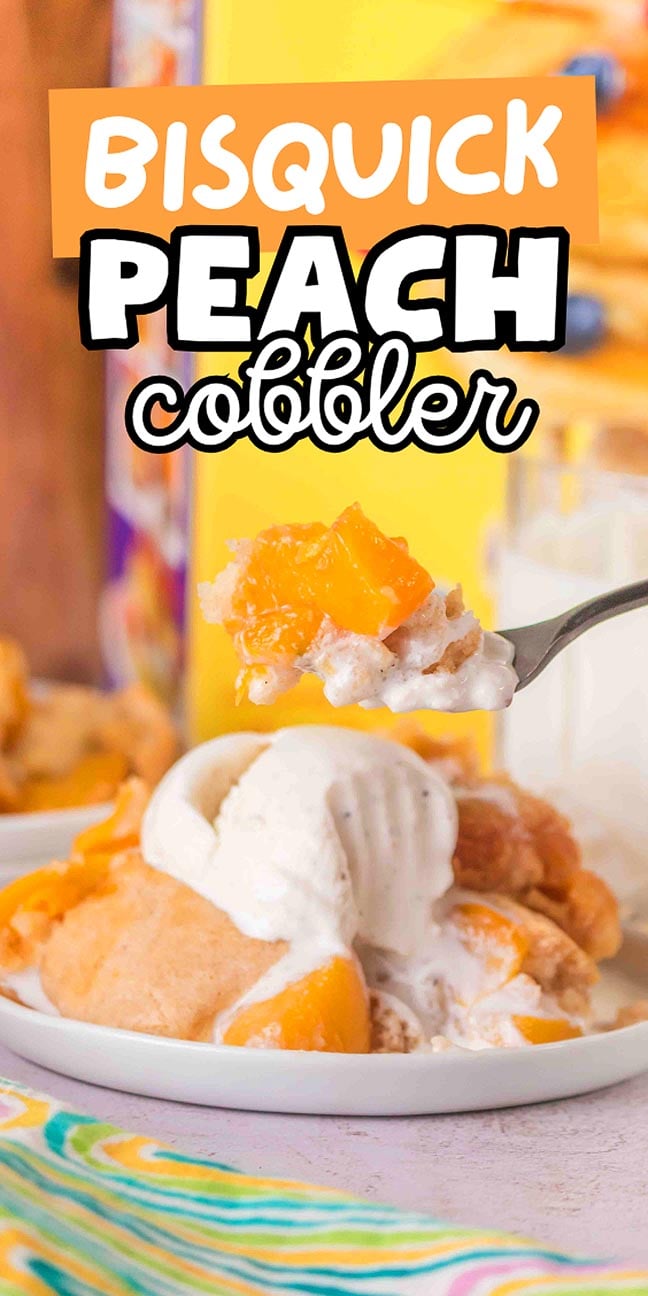 A plate of Bisquick peach cobbler topped with vanilla ice cream. A spoon holds a bit of the dessert.
