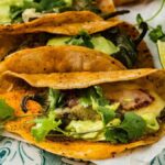 Three Mexican jalapeño popper tacos.