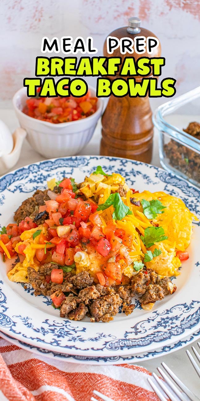 A meal prep breakfast taco bowl with ground meat, eggs, cheese, and salsa on a white and blue plate.