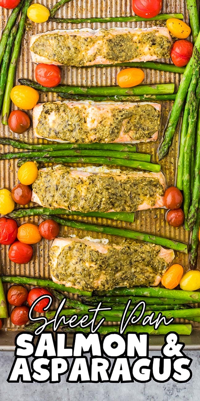 Sheet Pan Salmon and Asparagus with colorful cherry tomatoes, all topped with a fresh herb sauce for an easy, flavorful meal.