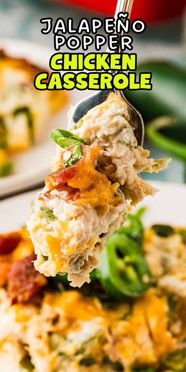A fork holds a cheesy bite of jalapeño popper casserole chicken with bacon and green onions.