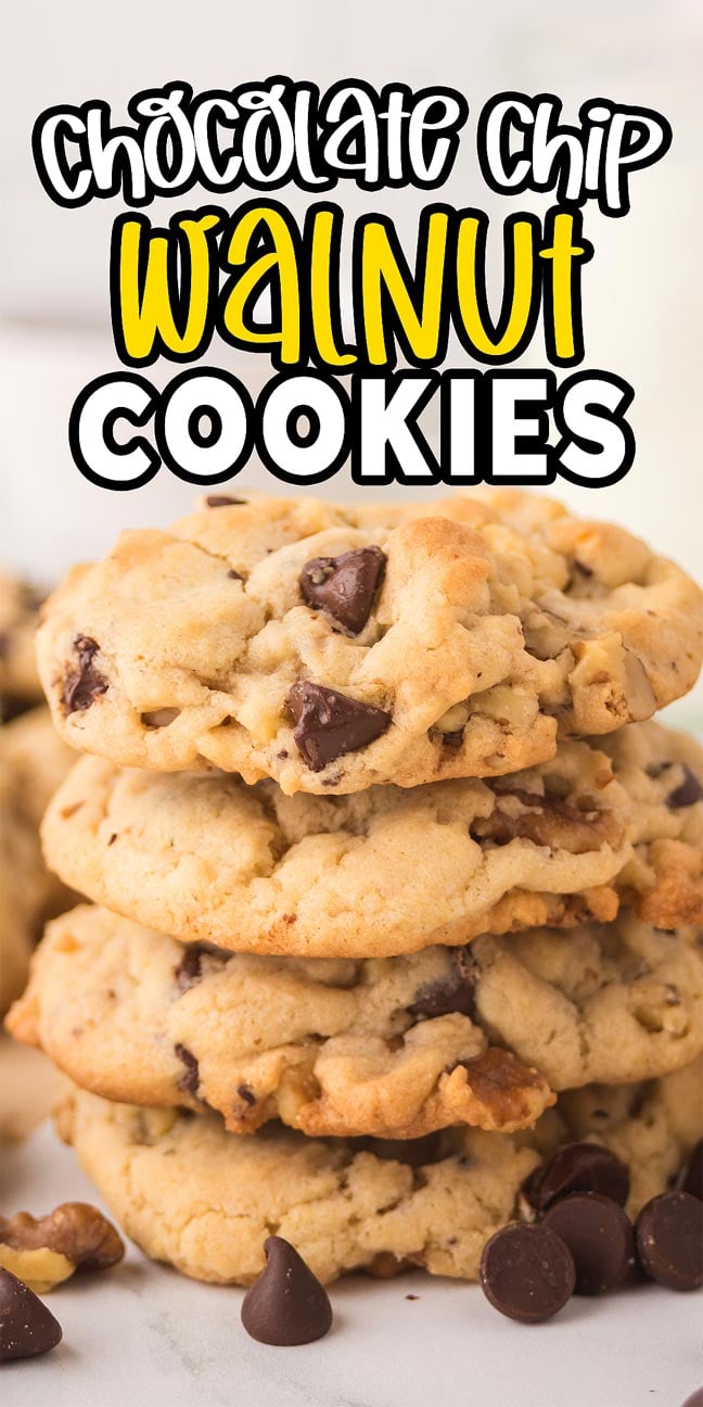 A tempting stack of chocolate chip walnut cookies sits tall, with extra chocolate chips scattered around for a delicious touch.