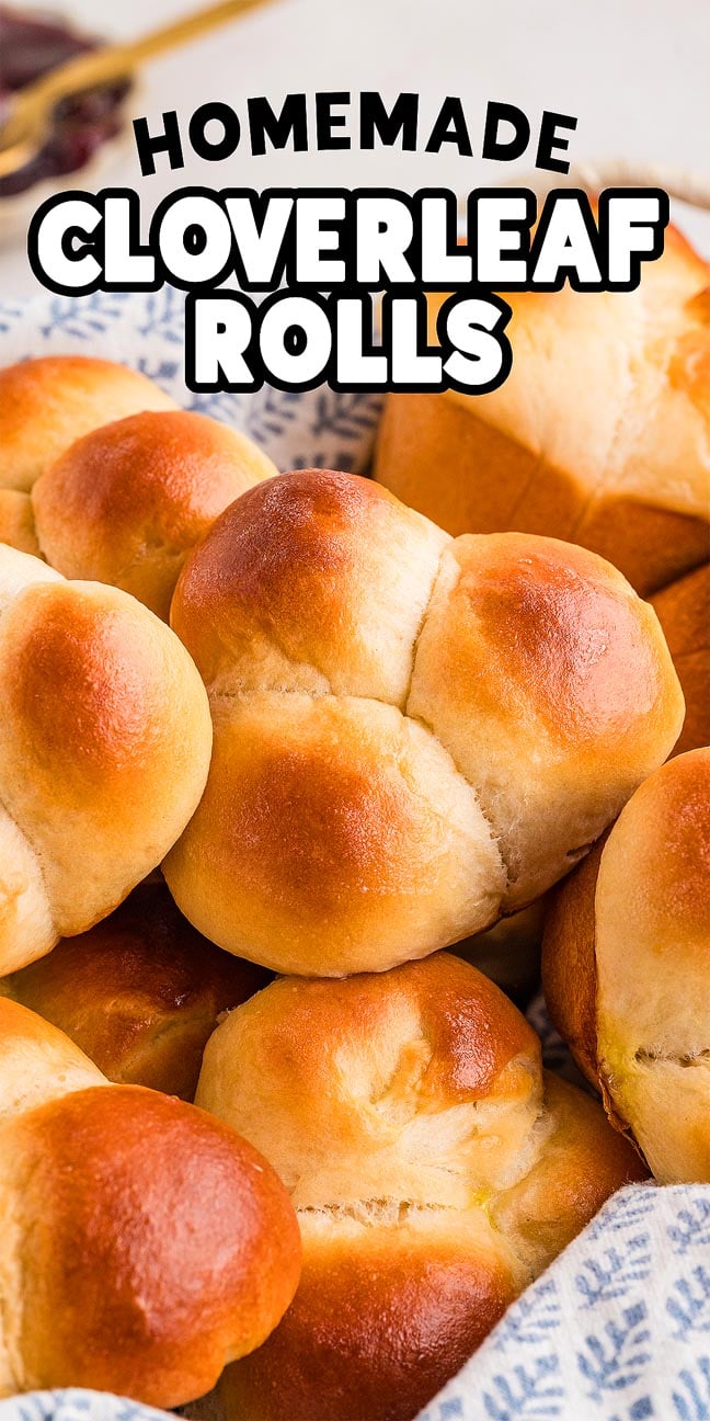 A basket filled with golden brown cloverleaf rolls, topped with bold text reading "Homemade Cloverleaf Rolls." The perfect treat for anyone craving soft, buttery cloverleaf rolls fresh from the oven.