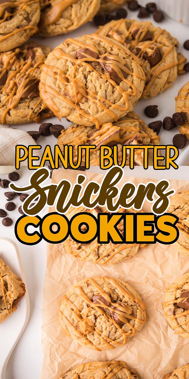 Peanut Butter Snickers Cookies topped with caramel drizzle are displayed on parchment and surrounded by chocolate chips.