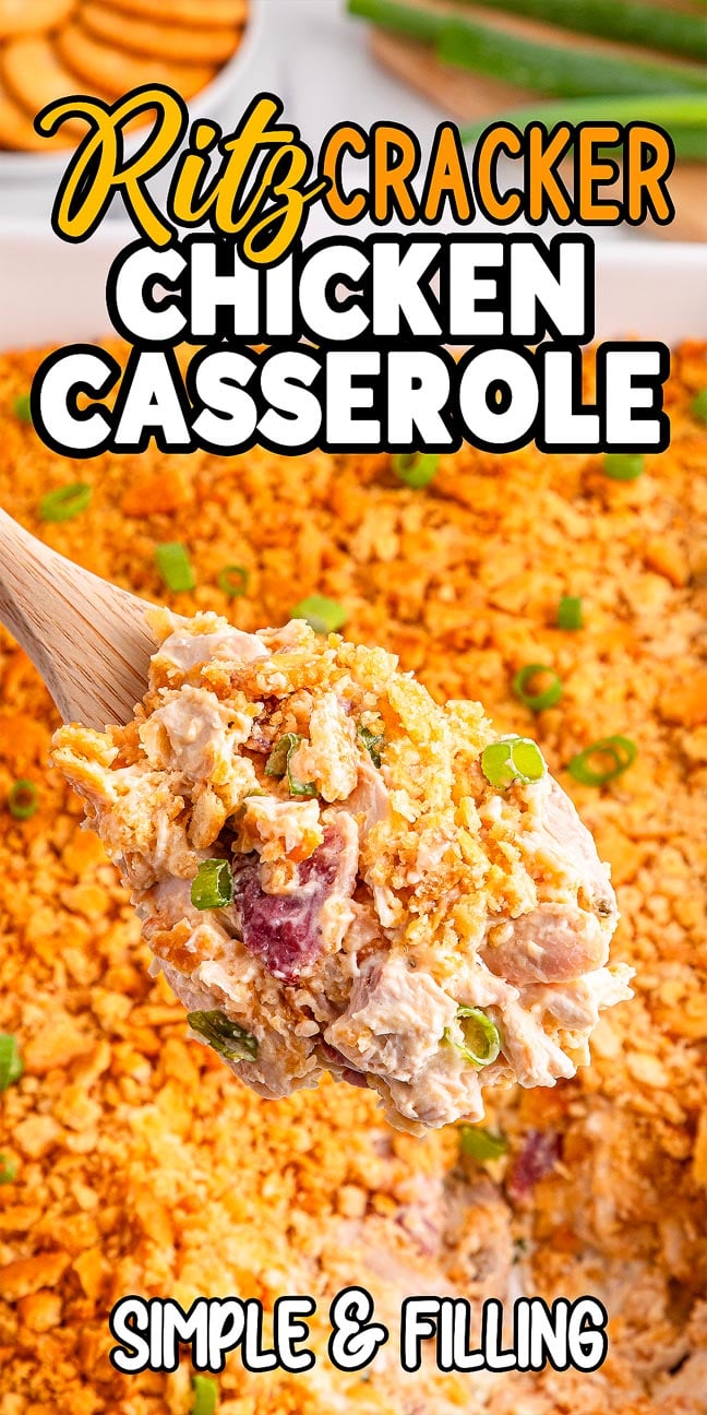 A wooden spoon scoops creamy Ritz Cracker Chicken Casserole, topped with crushed crackers and green onions.