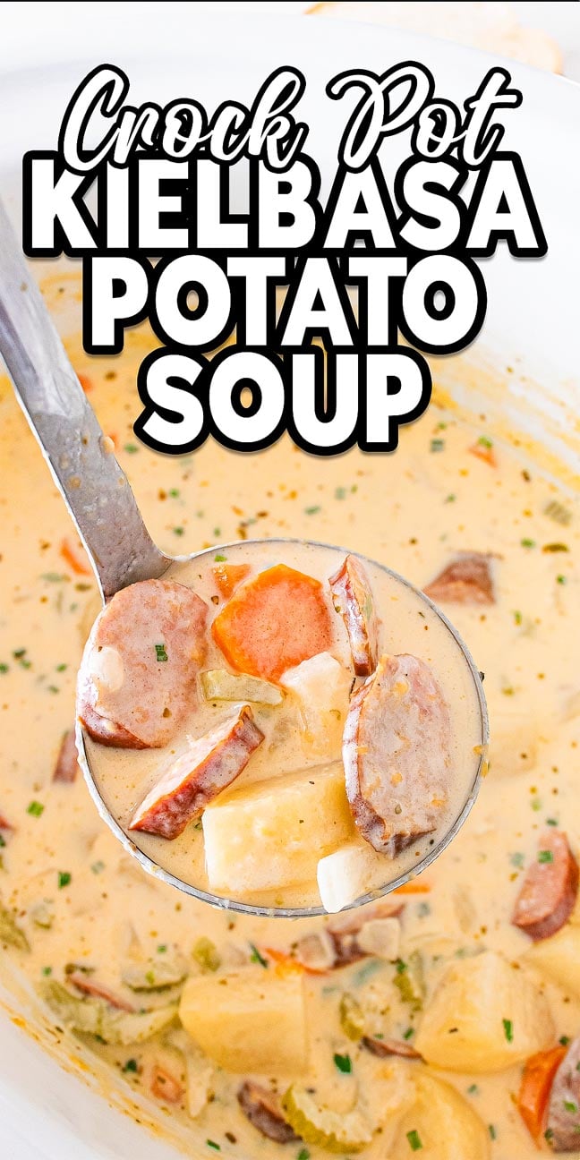 Ladle of creamy Slow Cooker Kielbasa Potato Soup with carrots and herbs, topped with the text “Crock Pot Kielbasa Potato Soup.”.