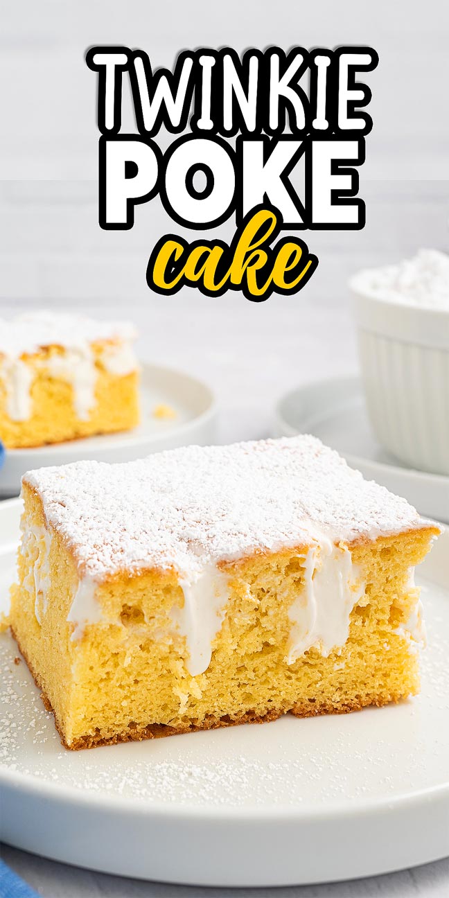 A slice of Twinkie Poke Cake with creamy filling and a dusting of powdered sugar sits on a white plate.