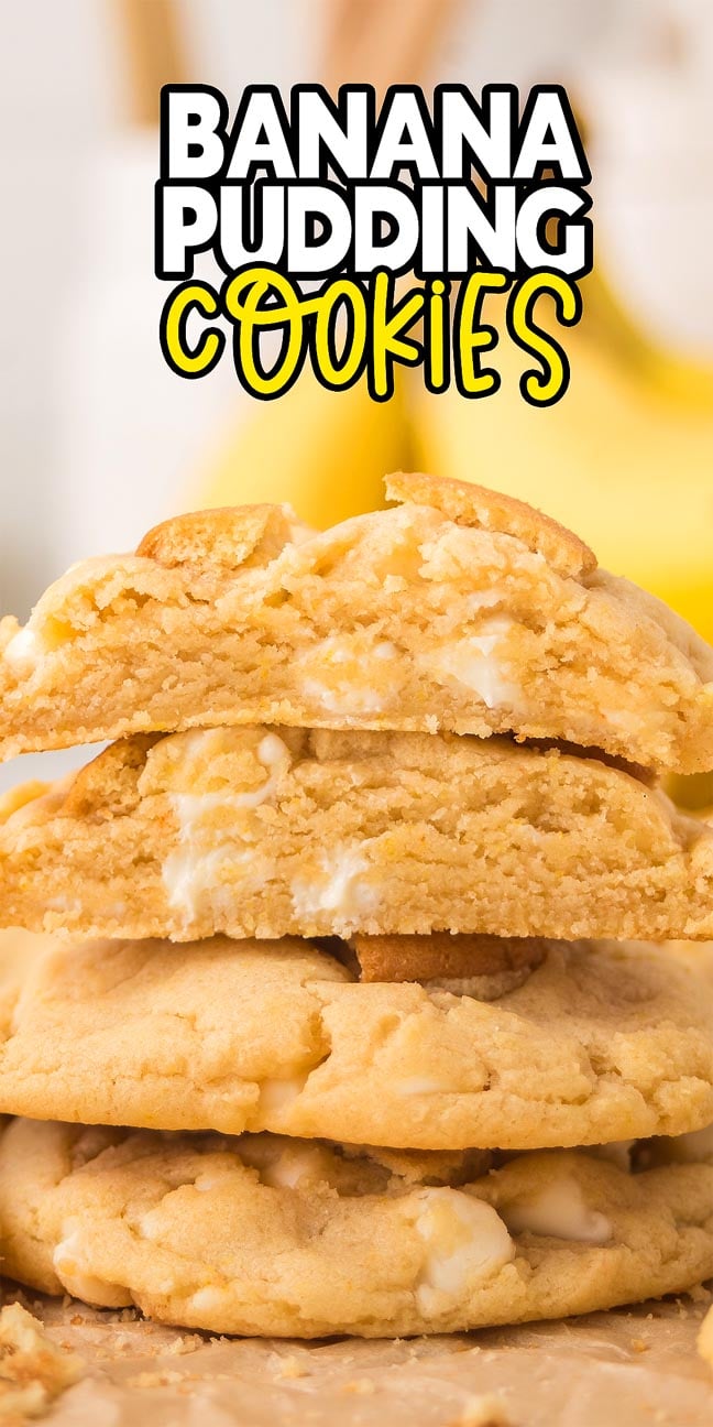 A stack of Banana Pudding Cookies, with one broken in half to reveal its soft, creamy interior.