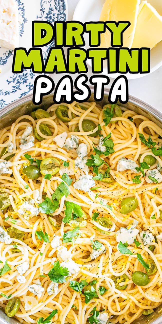 Spaghetti with green olives, blue cheese, and parsley in a pan—this dirty martini pasta is a bold twist on classic flavors.