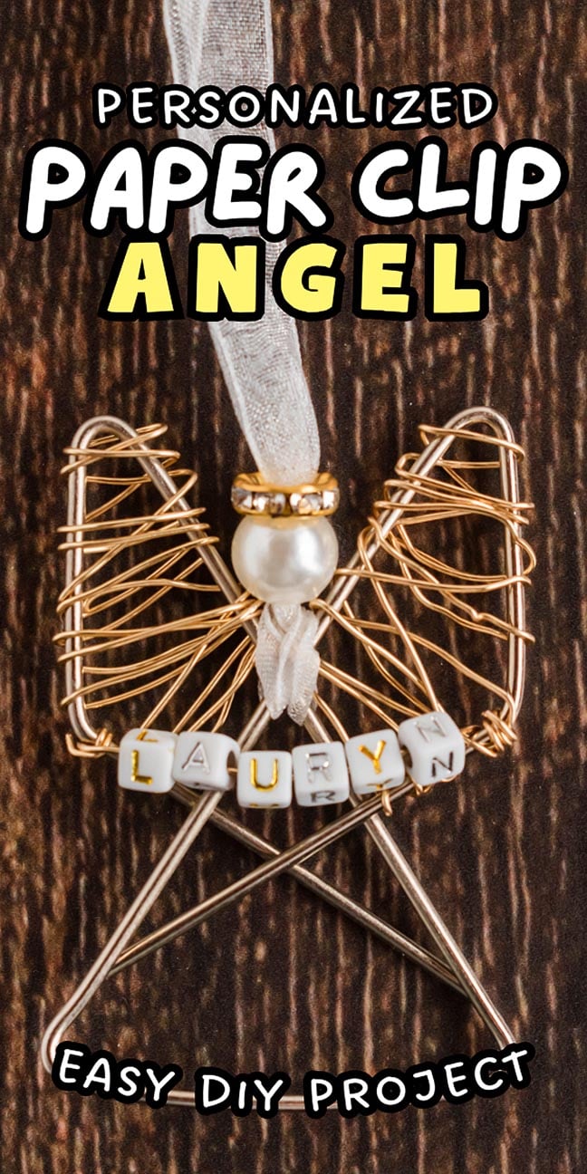 Easy personalized paper clip angel ornament made with beads and letter cubes spelling "LAURYN," displayed on a wooden surface.