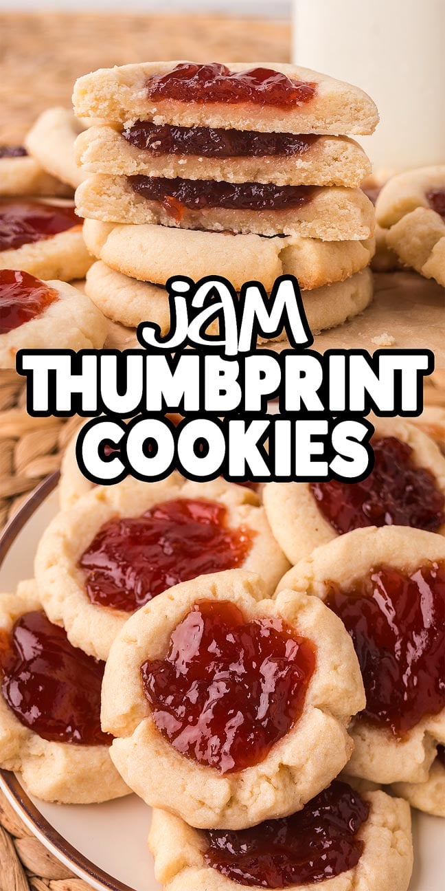Jam Thumbprint Cookies with a golden base and vibrant red jam centers are displayed on a plate, stacked in halves for an inviting, classic treat.