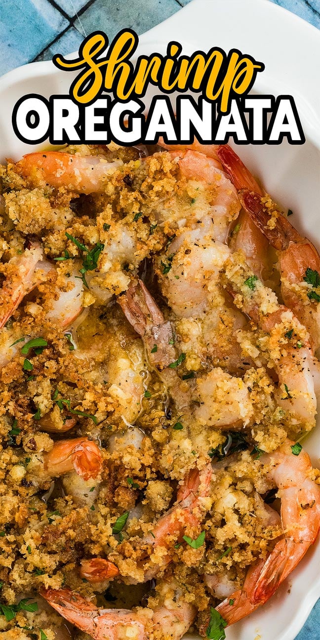 Shrimp Oreganata features baked shrimp topped with golden, crispy breadcrumbs and herbs, served hot in a white dish.