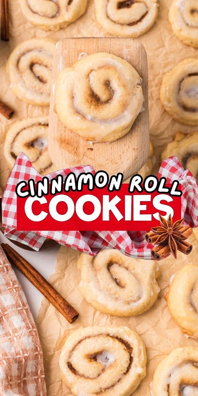 Cinnamon Roll Cookies on parchment paper with sweet icing and cinnamon sticks, text overlay reads “Cinnamon Roll Cookies.”.