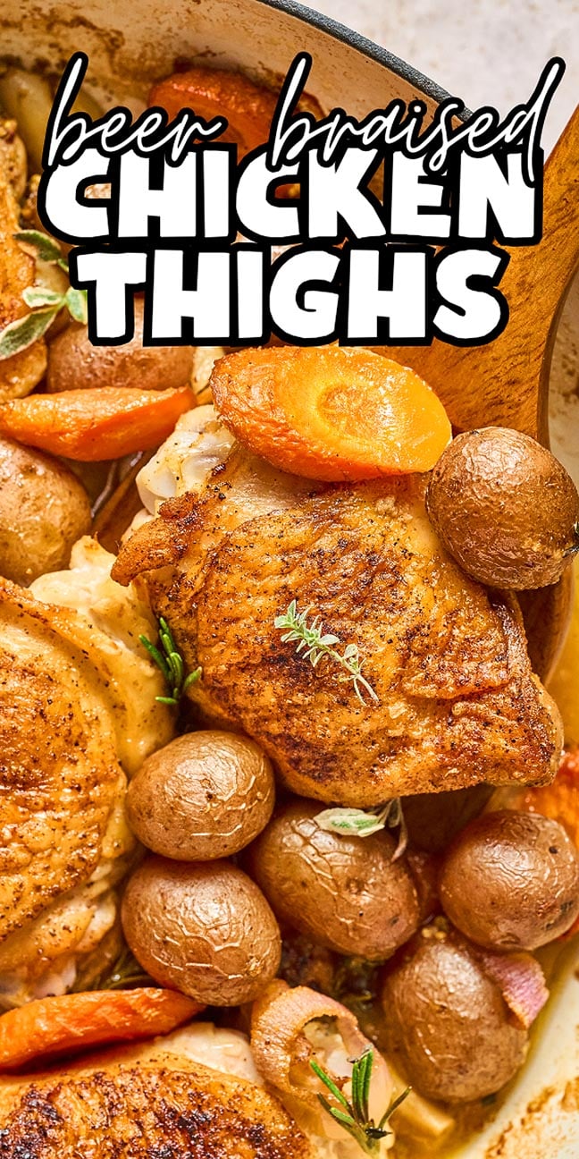 Golden-brown Beer Braised Chicken Thighs with carrots and potatoes in a skillet, topped with fresh herbs. Text reads "beer braised chicken thighs.