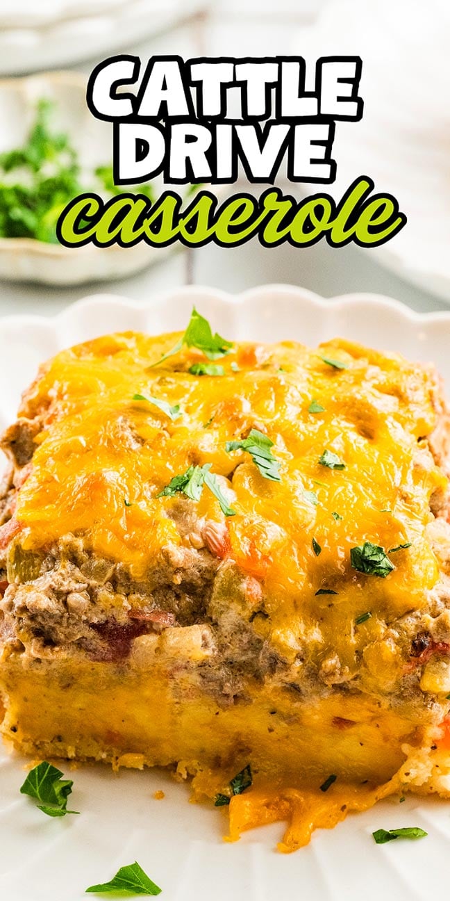 A cheesy Cattle Drive Casserole slice on a plate, topped with melted cheddar and parsley. Text: "Cattle Drive Casserole.
