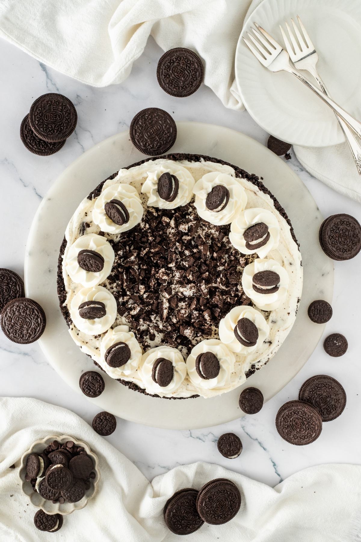 A cake with cookies on top.