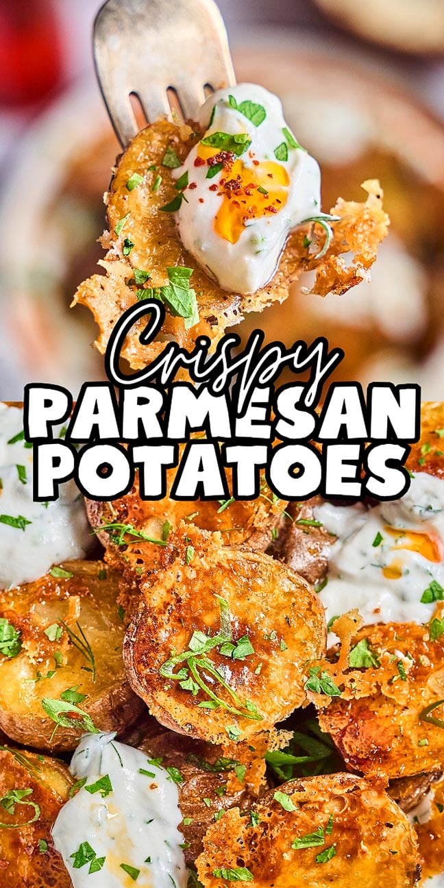 Fork holding a Crispy Parmesan Potato topped with sour cream and herbs; more golden Crispy Parmesan Potatoes are stacked below.
