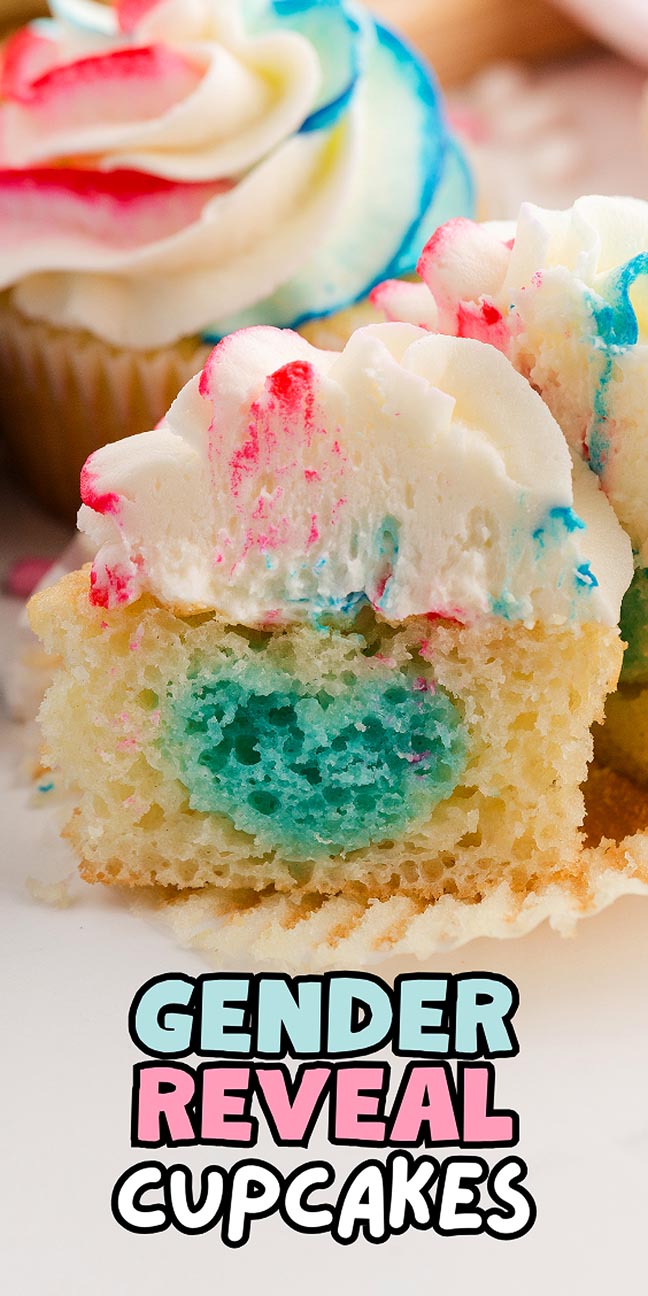 Cupcake with blue filling and pink, blue, and white frosting, perfect for gender reveal cupcakes.