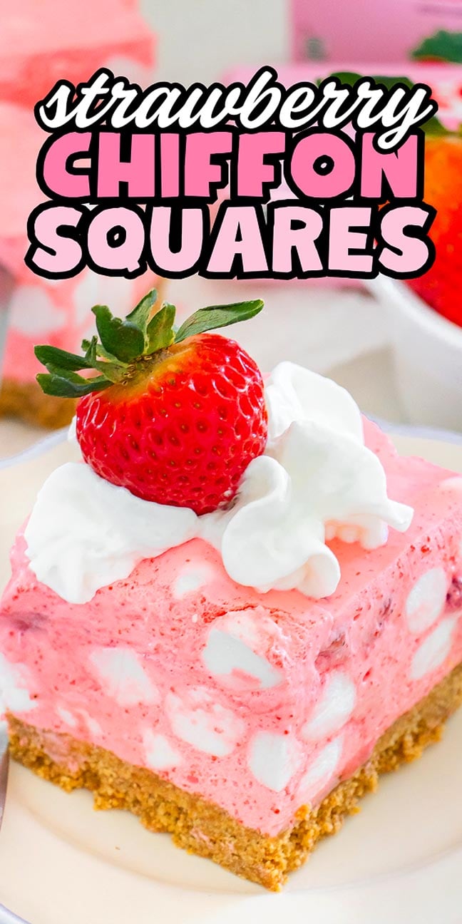 A slice of strawberry chiffon square topped with whipped cream and a fresh strawberry on a plate—these strawberry chiffon squares are the perfect light and airy dessert for any occasion.