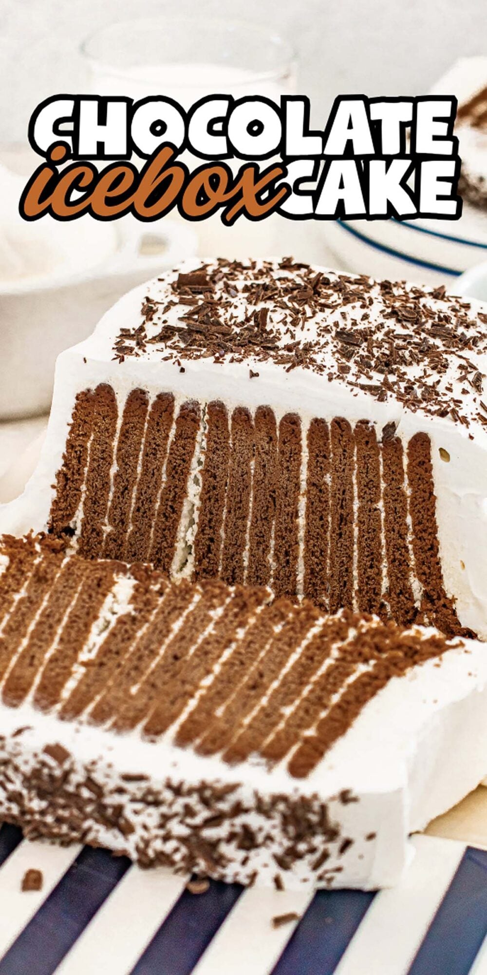 A classic Chocolate Icebox Cake featuring layers of chocolate cookies and whipped cream, finished with a sprinkle of rich chocolate shavings.