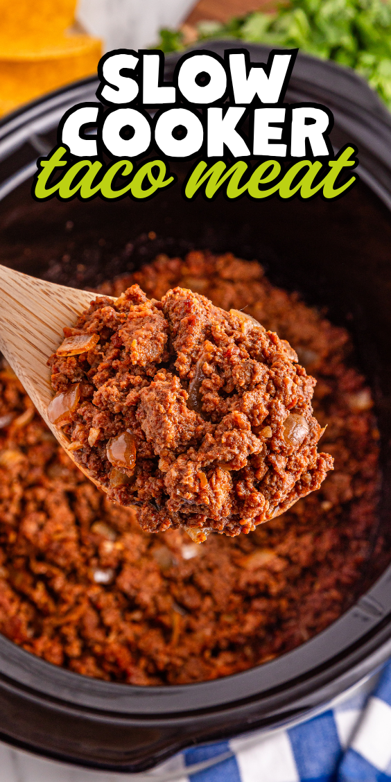 A wooden spoon holds seasoned Slow Cooker Taco Meat over a simmering pot, with text reading "Slow Cooker Taco Meat.