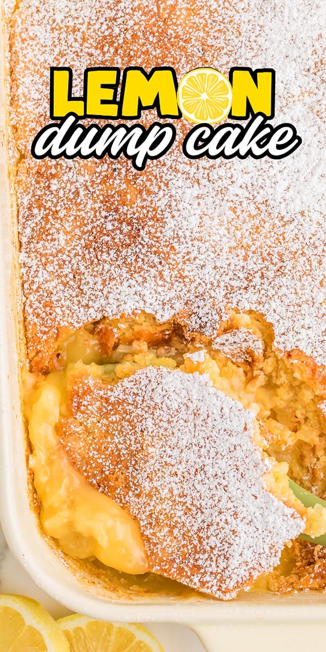 Golden lemon dump cake dusted with powdered sugar in a baking dish, with a slice of the sweet and tangy lemon dump cake removed.