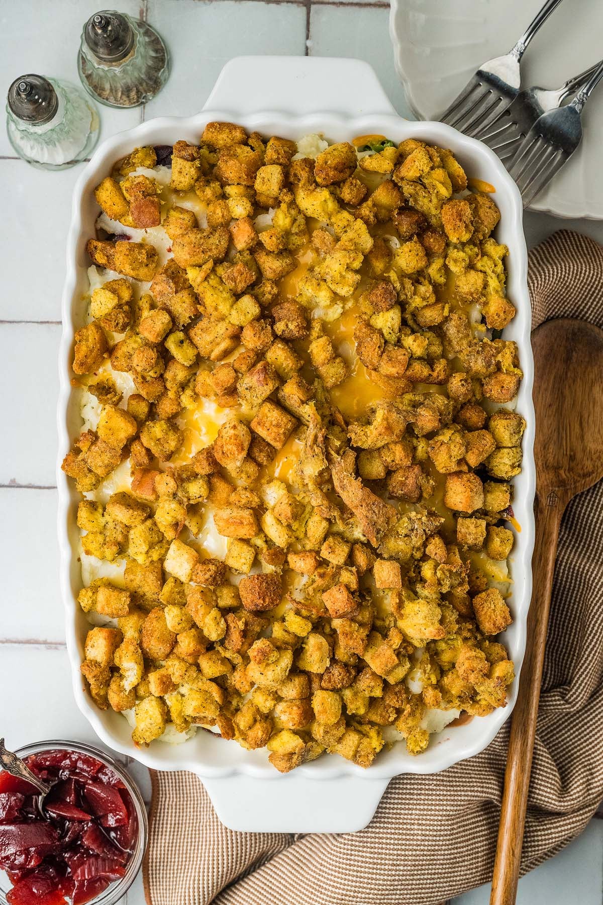 A rectangular baking dish filled with a casserole made from Thanksgiving leftovers.